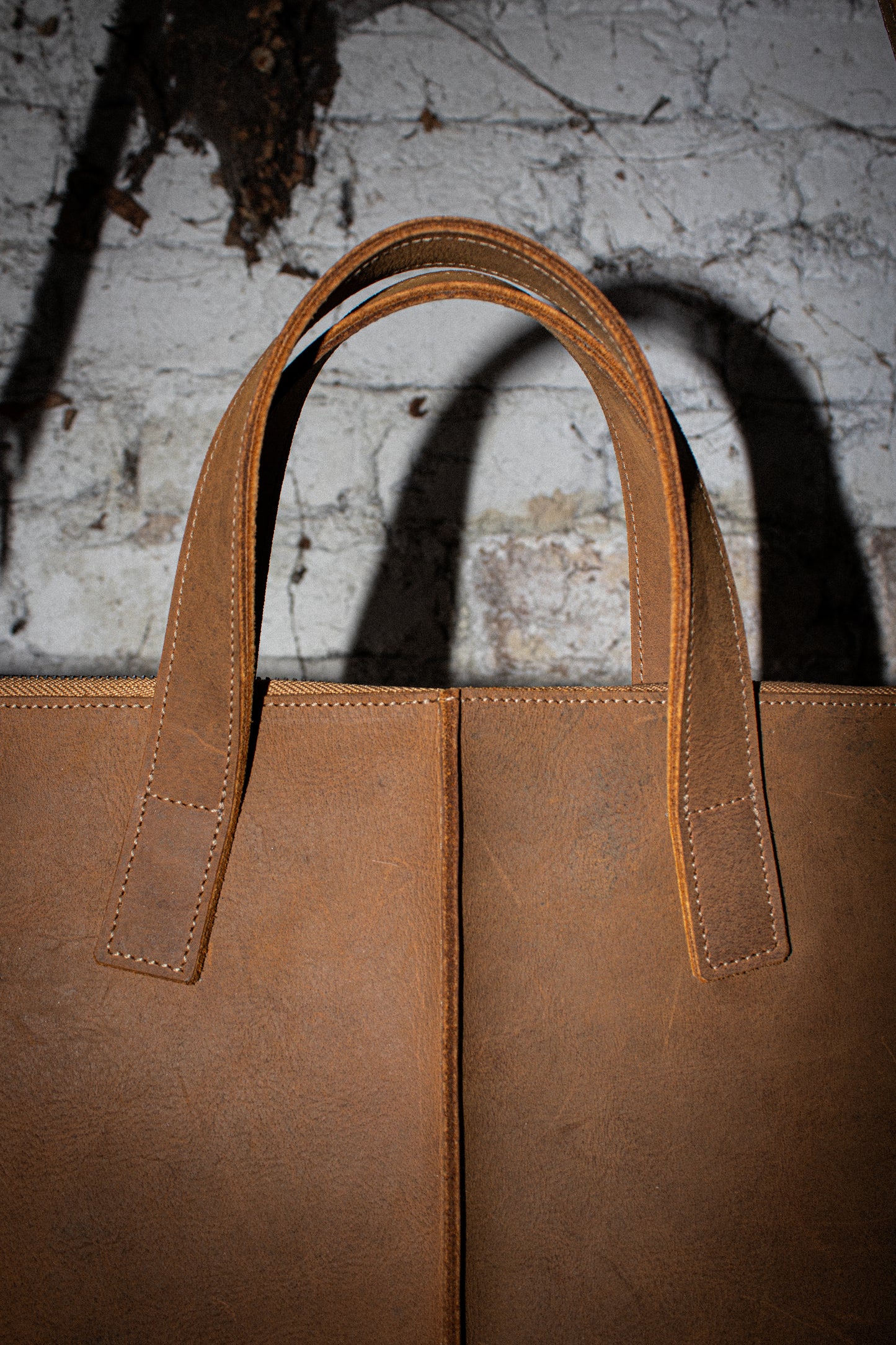 pull-up leather laptop bag