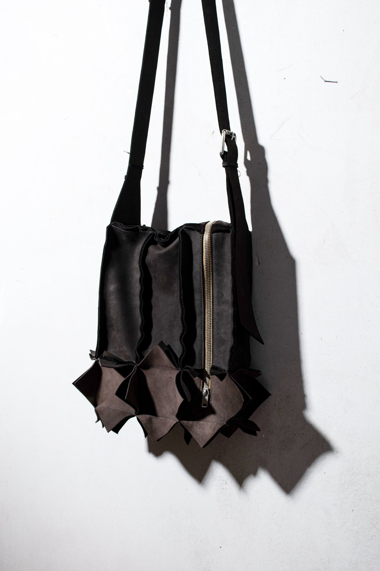 asymmetrical zip messenger