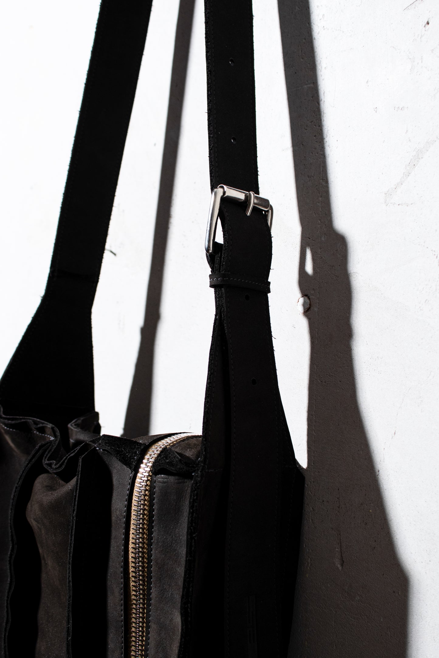 asymmetrical zip messenger