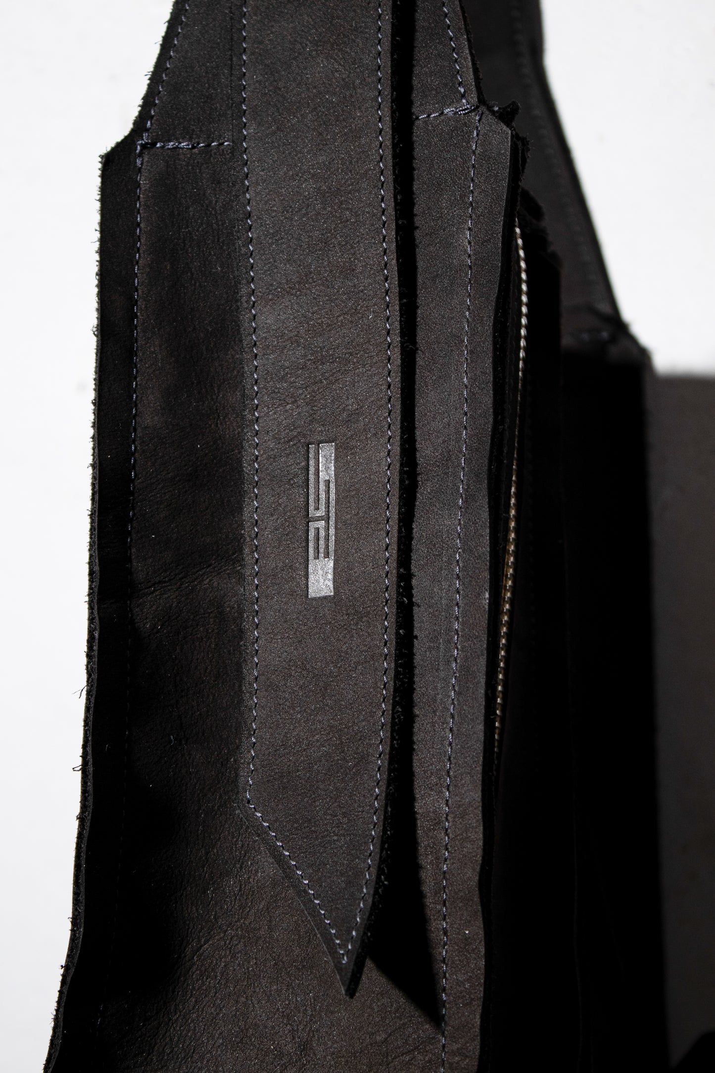 asymmetrical zip messenger