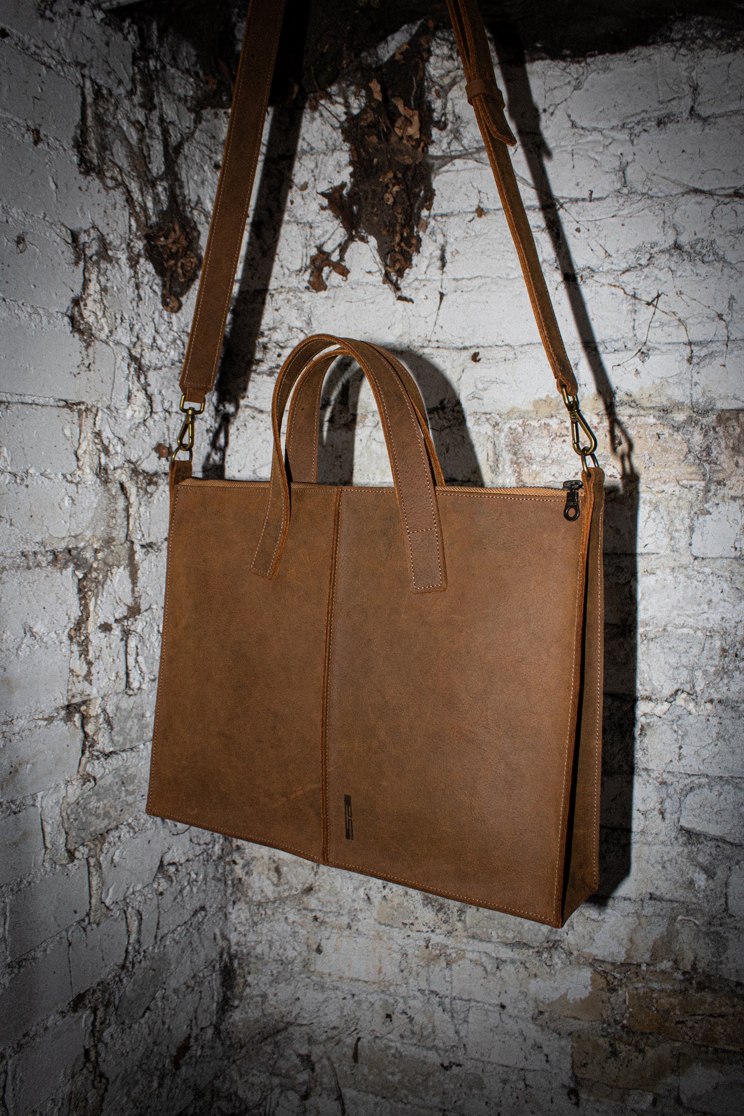 pull-up leather laptop bag